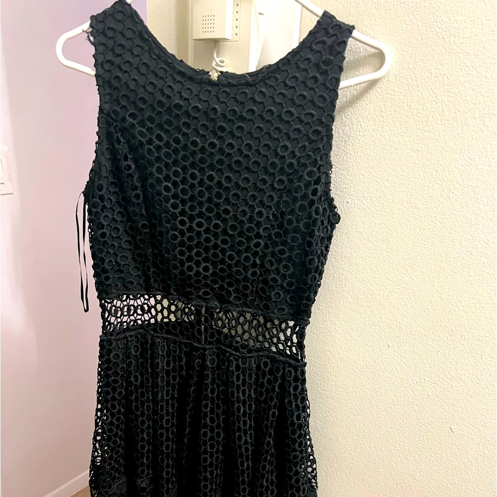 Black knee length dress black with white center strip.